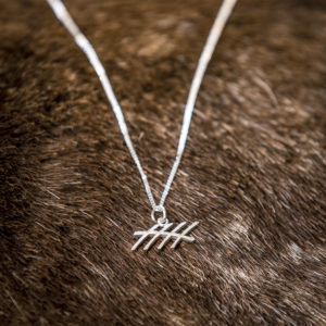 Fence necklace. Silver chain, reindeer horn.