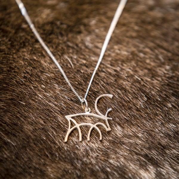 Male reindeer necklace. Silver chain, reindeer horn.