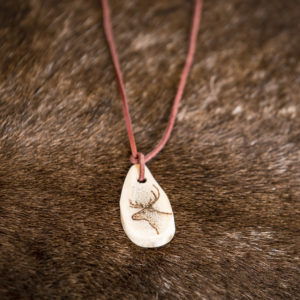 Reindeer horn necklace. Woven leather ribbon 70 cm, reindeer horn.