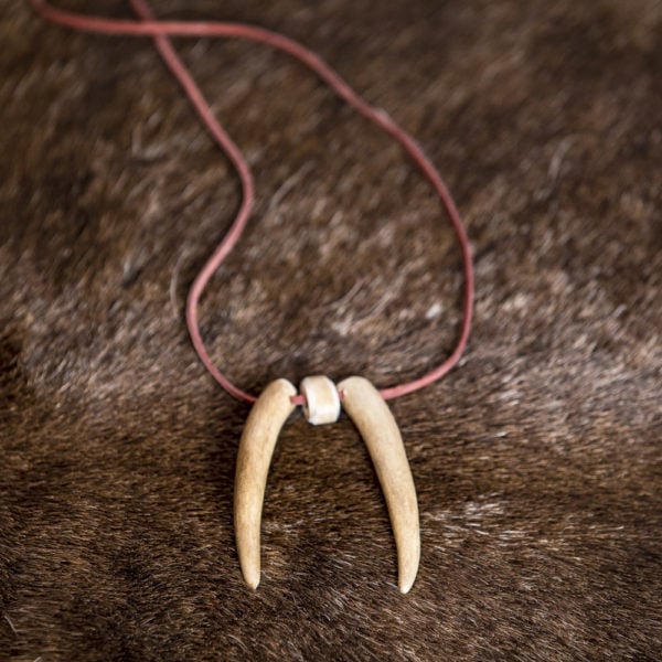 Reindeer horn pendant. Woven leather ribbon 90 cm, reindeer horn.